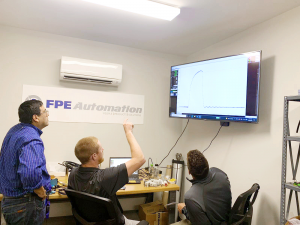 At FPE Automation, Sunset Hills, MO: Steve Carrera, Cody Schmelzle and Kurt Vaeth work in the pneumatic lab using the MAC TLD app.